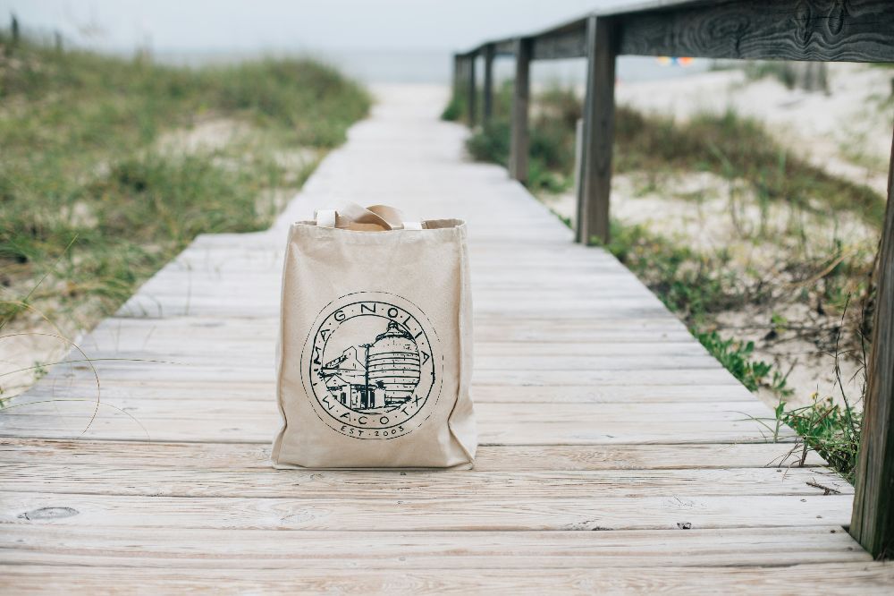 Branded eco-friendly cotton tote bag with company logo