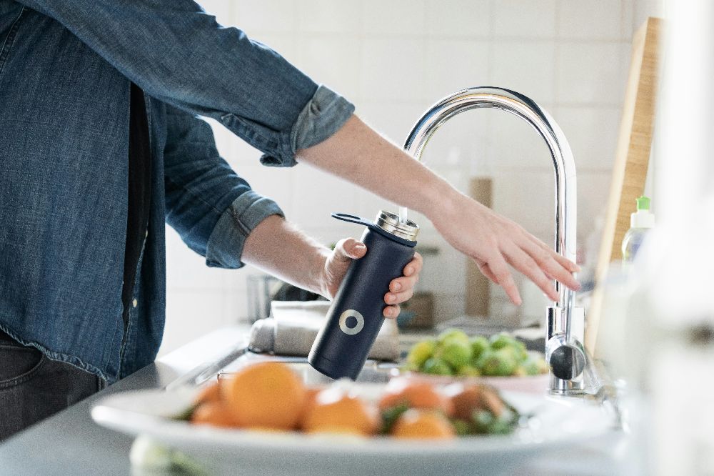 Reusable branded stainless steel water bottle with logo